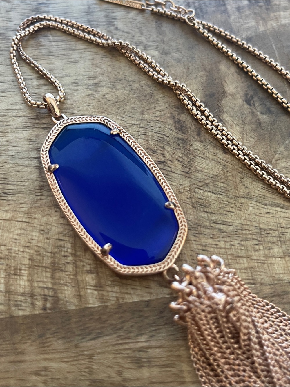 Kendra Scott necklace in cobalt and rose gold
